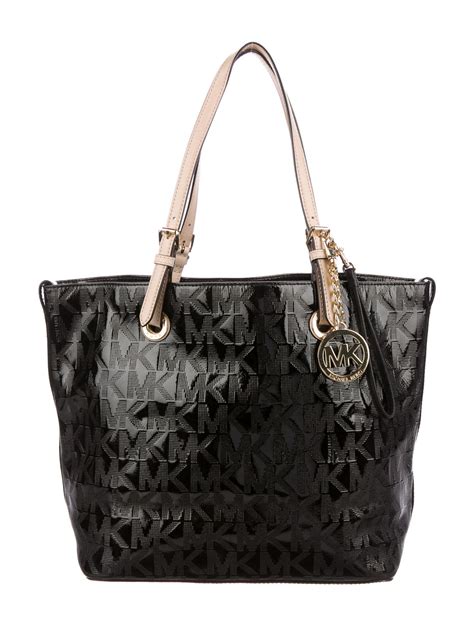 michael kors schmetterling set|Michael Kors leather tote.